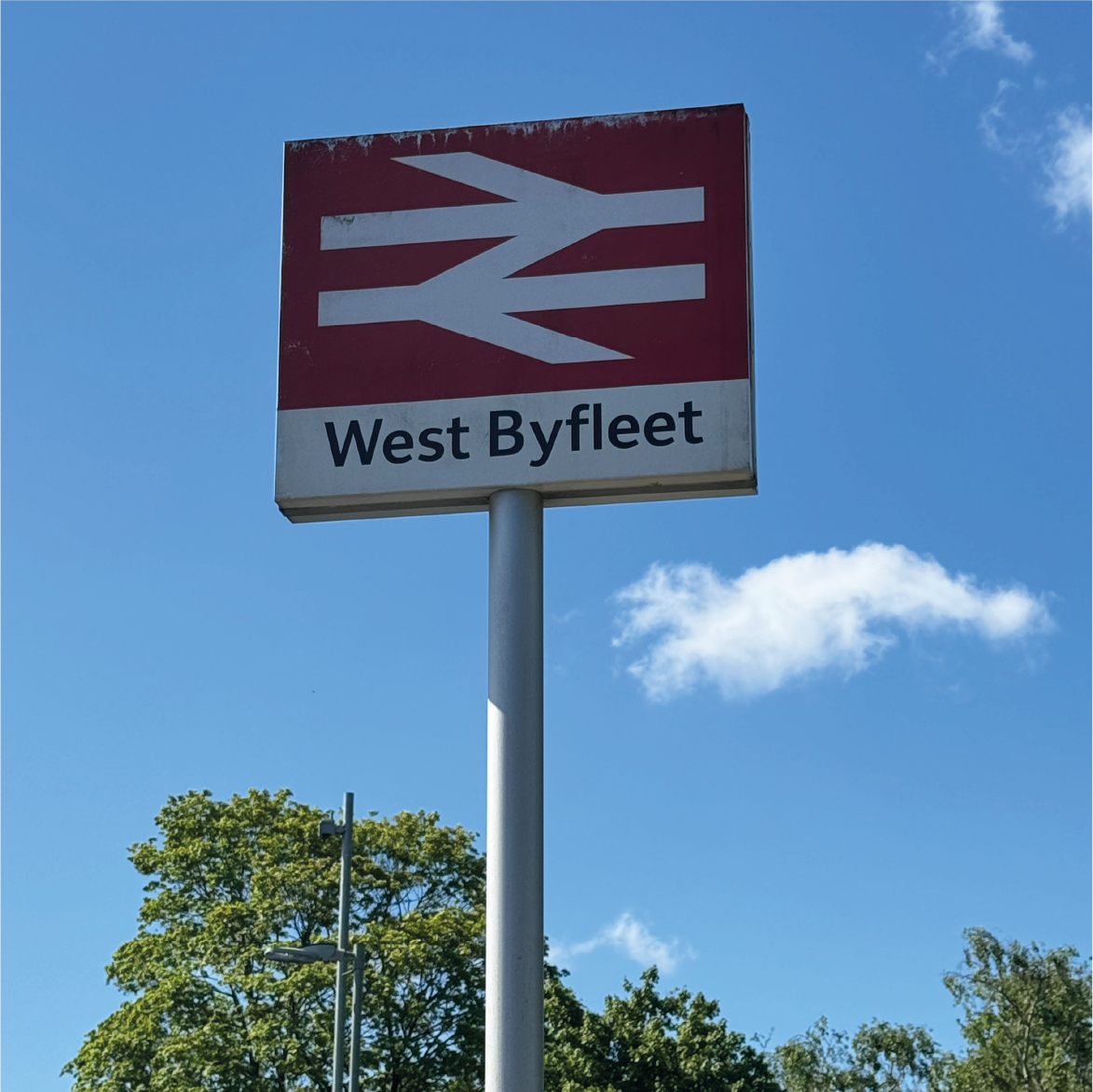 Alexander Rumsey Real Estate - West Byfleet Train Station sign image Alexander Rumsey Real Estate - West Byfleet Train Station sign image
